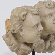 Carved white marble winged angel heads ornaments, Italy circa 1650-1750