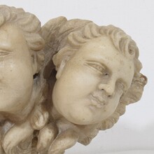 Carved white marble winged angel heads ornaments, Italy circa 1650-1750