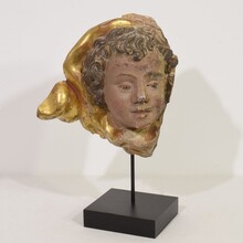 Carved wooden baroque angel head ornament, Italy circa 1650-1750