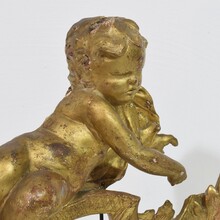 Carved giltwood baroque angel on curl ornament, Italy circa 1750