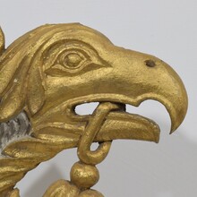 Carved giltwood baroque eaglehead, Italy circa 1750