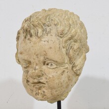 Chalk/ cast stone angel head, Italy circa 1750