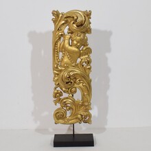 Large hand carved giltwood baroque curl ornament with angel, Italy circa 1750
