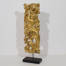 Large hand carved giltwood baroque curl ornament with angel, Italy circa 1750