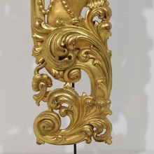 Large hand carved giltwood baroque curl ornament with angel, Italy circa 1750