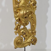Large hand carved giltwood baroque curl ornament with angel, Italy circa 1750