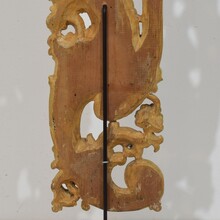 Large hand carved giltwood baroque curl ornament with angel, Italy circa 1750