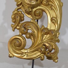 Large hand carved giltwood baroque curl ornament with angel, Italy circa 1750