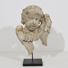 Pair carved wooden winged angel head ornaments, Italy circa 1650-1750