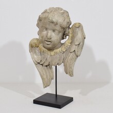 Pair carved wooden winged angel head ornaments, Italy circa 1650-1750