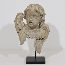 Pair carved wooden winged angel head ornaments, Italy circa 1650-1750