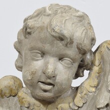 Pair carved wooden winged angel head ornaments, Italy circa 1650-1750