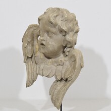 Pair carved wooden winged angel head ornaments, Italy circa 1650-1750