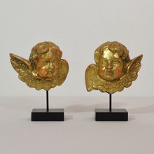 Pair giltwood baroque winged angel heads, Italy circa 1750