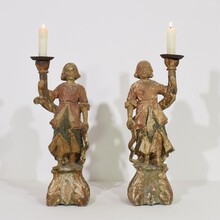 Pair baroque angel figures with candleholders, Italy circa 1650-1700