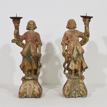 Pair baroque angel figures with candleholders, Italy circa 1650-1700