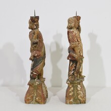 Pair baroque angel figures with candleholders, Italy circa 1650-1700