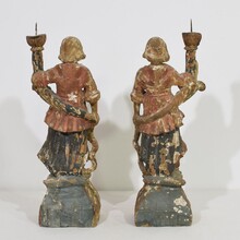 Pair baroque angel figures with candleholders, Italy circa 1650-1700