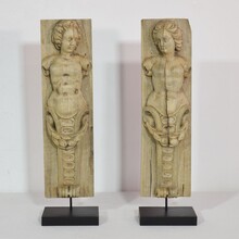 Pair of wooden baroque panels with caryatids, France circa 1750