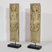 Pair of wooden baroque panels with caryatids, France circa 1750