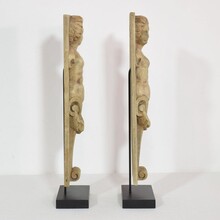 Pair of wooden baroque panels with caryatids, France circa 1750