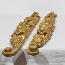 Pair of large giltwood baroque ornaments, Italy circa 1750