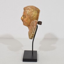 Small baroque carved giltwood angel head on wings, France circa 1750