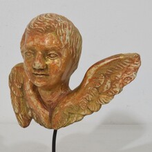 Small baroque carved giltwood angel head on wings, France circa 1750