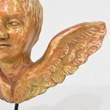 Small baroque carved giltwood angel head on wings, France circa 1750