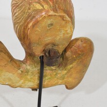 Small baroque carved giltwood angel head on wings, France circa 1750