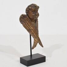 Small carved wood winged angel head, France circa 1800-1850