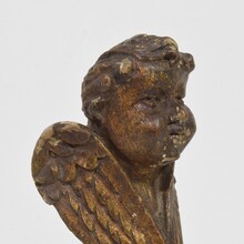 Small carved wood winged angel head, France circa 1800-1850