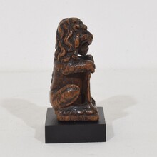 Small hand carved lion sculpture with coat of arms, France circa 1650-1750