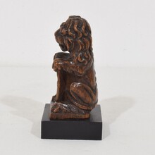 Small hand carved lion sculpture with coat of arms, France circa 1650-1750