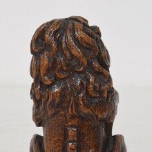 Small hand carved lion sculpture with coat of arms, France circa 1650-1750
