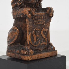 Small hand carved lion sculpture with coat of arms, France circa 1650-1750