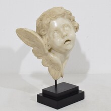 Carved white marble winged angel head ornament, Spain circa 1750