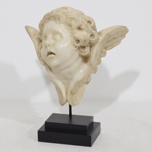 Carved white marble winged angel head ornament, Spain circa 1750