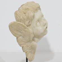 Carved white marble winged angel head ornament, Spain circa 1750