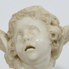 Carved white marble winged angel head ornament, Spain circa 1750