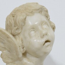 Carved white marble winged angel head ornament, Spain circa 1750