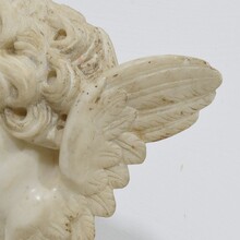 Carved white marble winged angel head ornament, Spain circa 1750