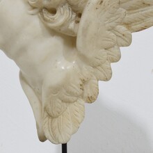 Carved white marble winged angel head ornament, Spain circa 1750