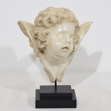 Carved white marble winged angel head, Spain circa 1750