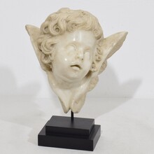 Carved white marble winged angel head, Spain circa 1750