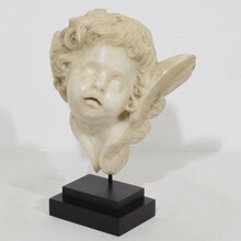 Carved white marble winged angel head, Spain circa 1750