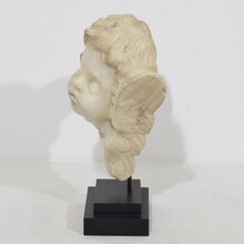 Carved white marble winged angel head, Spain circa 1750