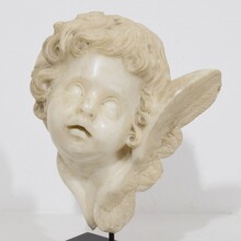 Carved white marble winged angel head, Spain circa 1750