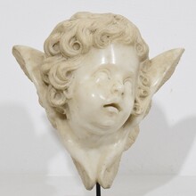 Carved white marble winged angel head, Spain circa 1750