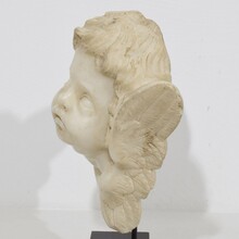 Carved white marble winged angel head, Spain circa 1750